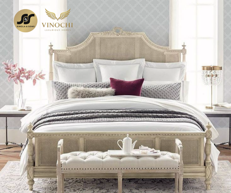 Elegant layered bed styling with soft neutral palette