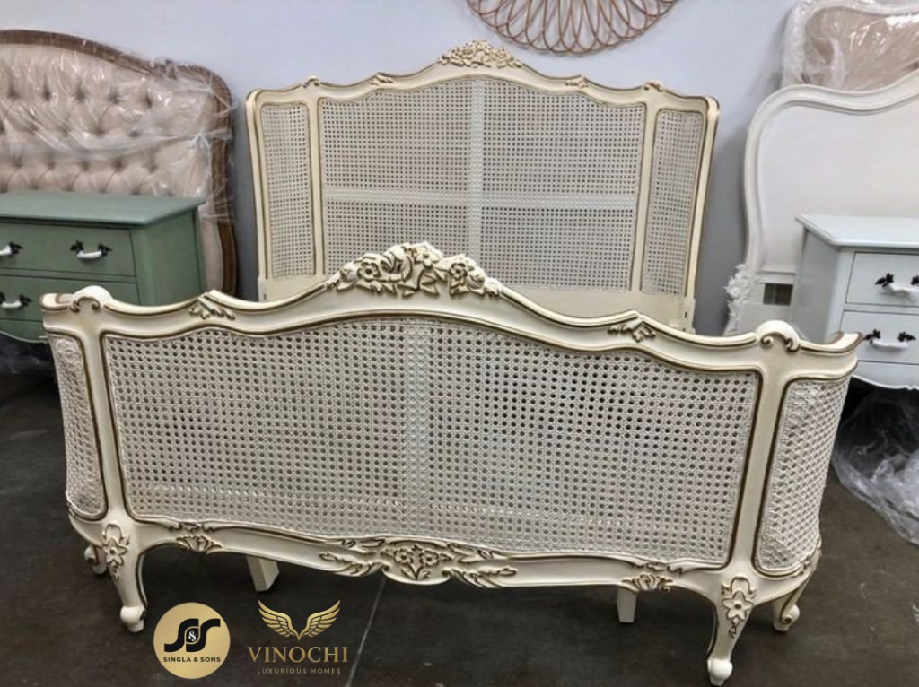 Vintage-style cane bed showcased in a luxury furniture studio